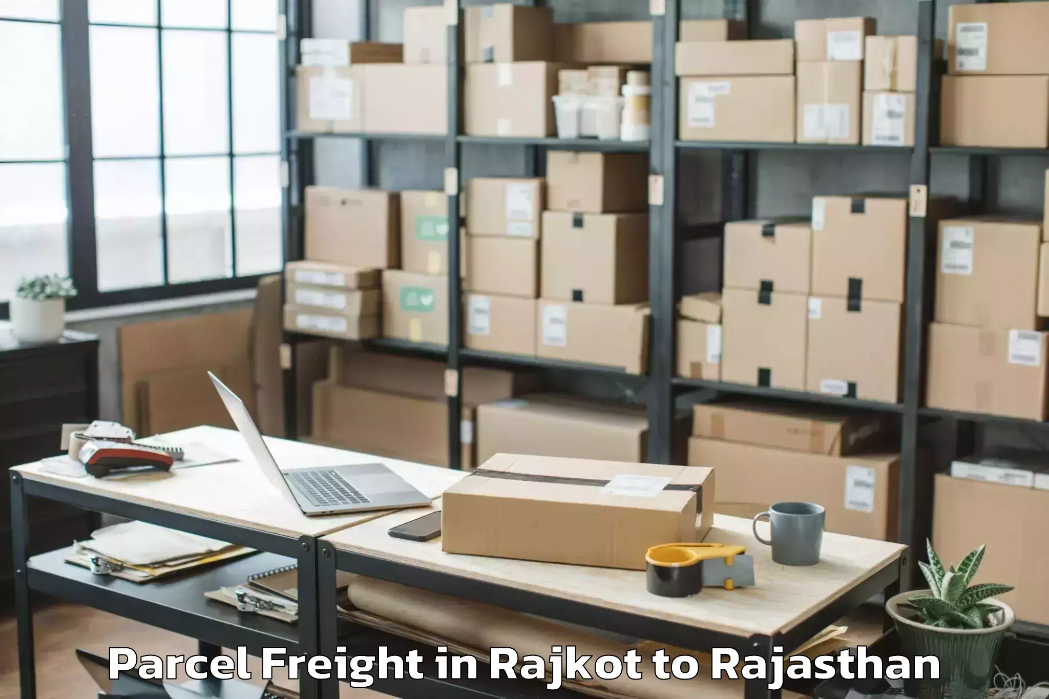 Top Rajkot to Pacific University India Udaip Parcel Freight Available